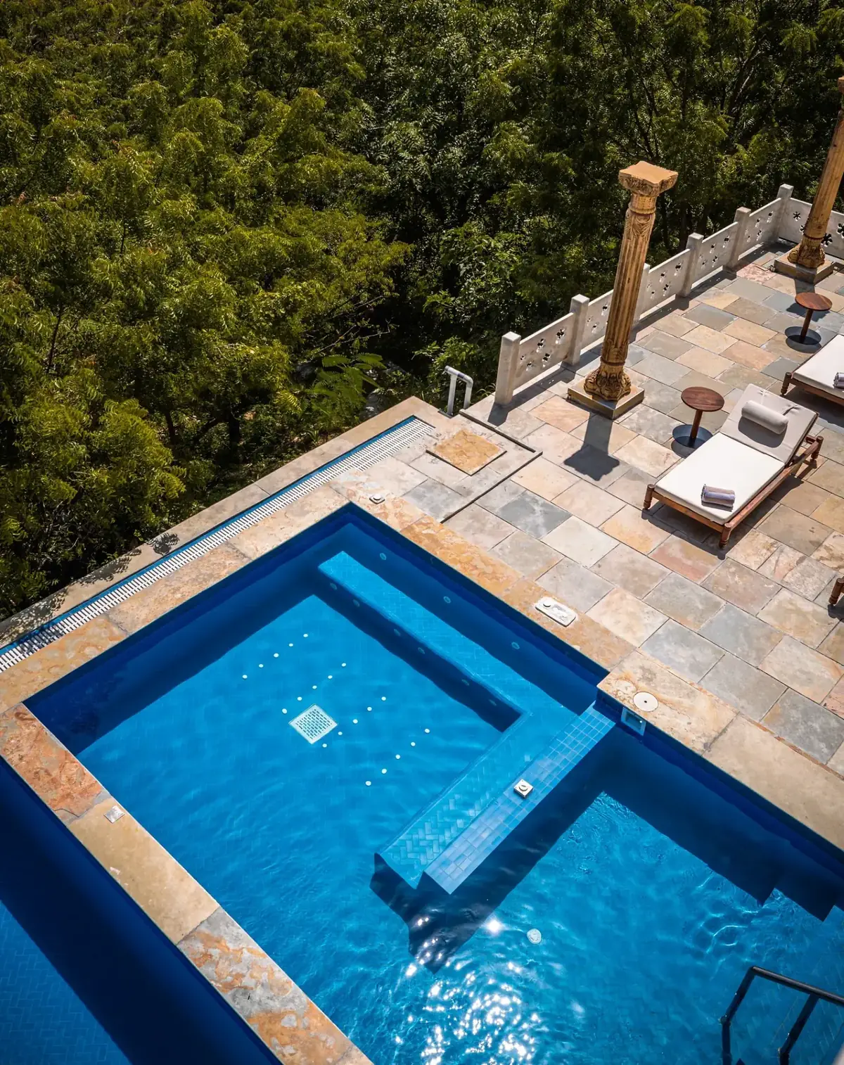 Private plunge pool surrounded by forest