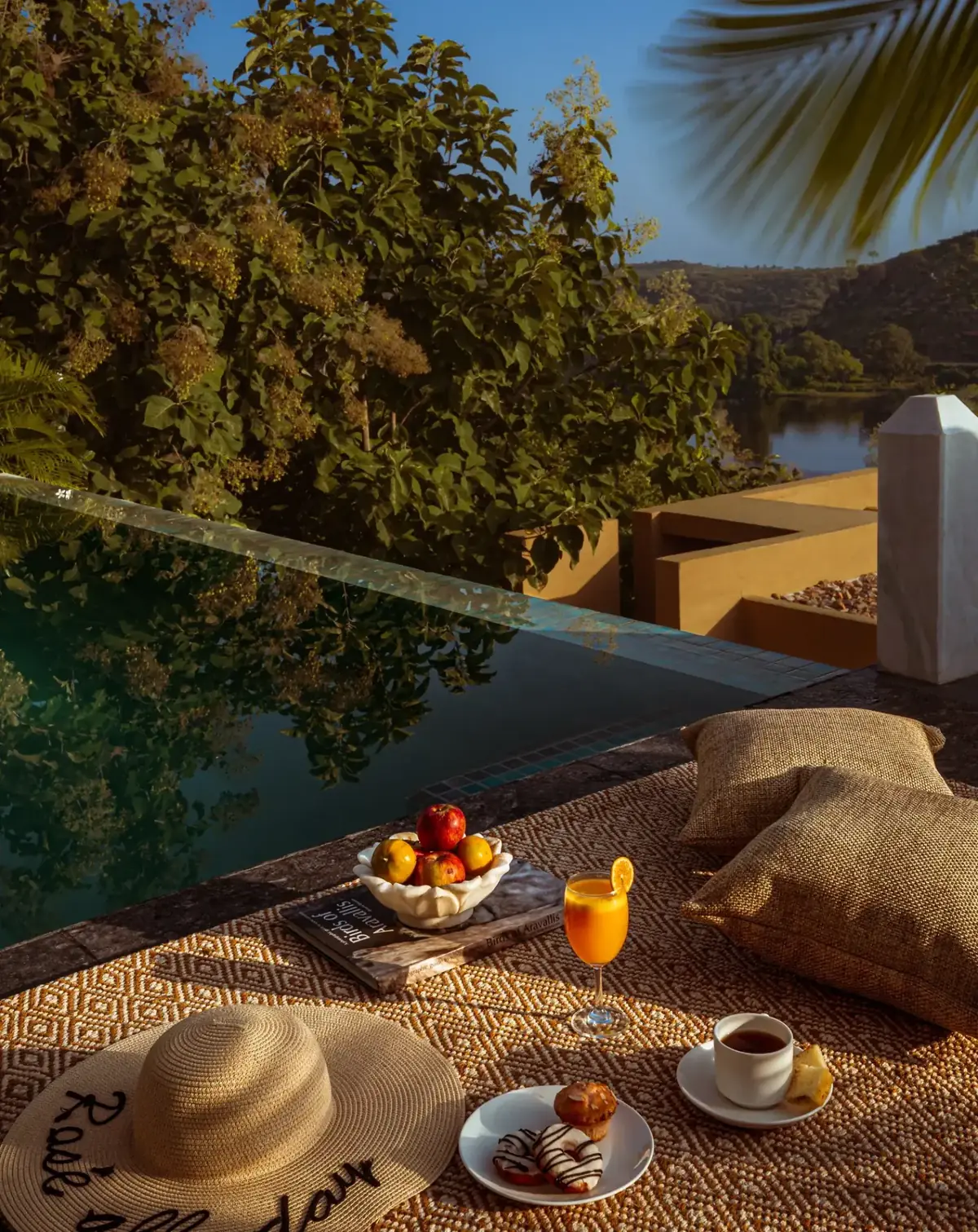 Poolside breakfast overlooking Bagela Lake